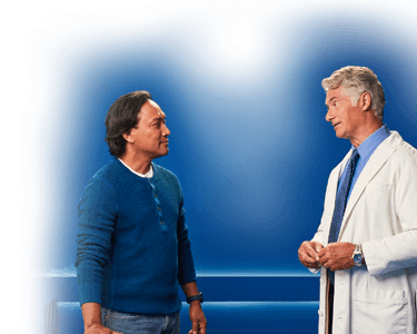 male patient talking to doctor about Peyronie's disease